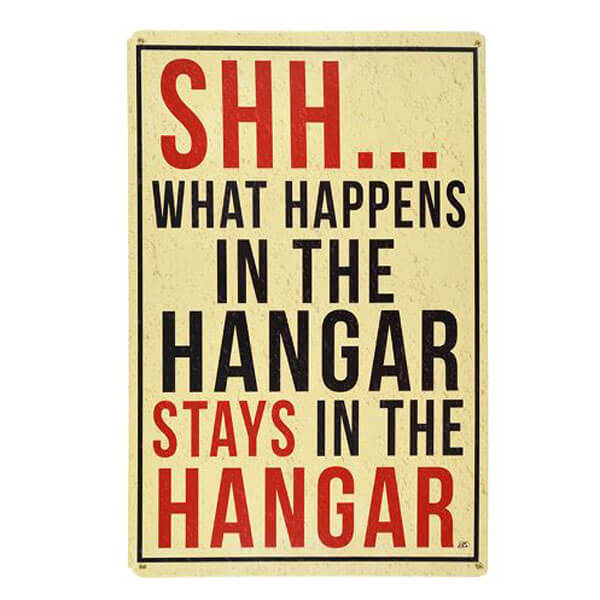 Shh... What Happens IN THE Hangar Metal Sign